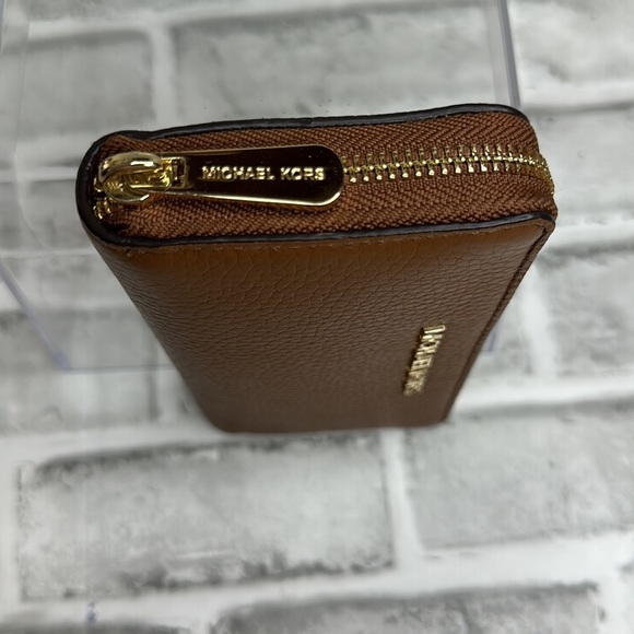 Michale Kors brown pebbled leather wallet.  Gold tone hardware. Zippered closure - Picture 3 of 8
